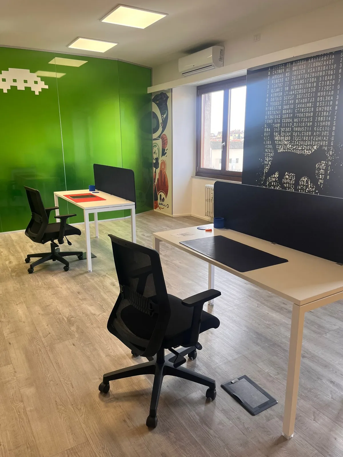 Vista delle postazioni coworking Hub Florence
